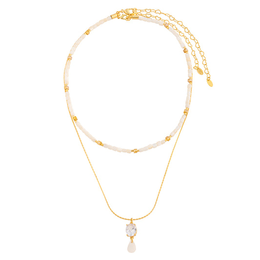 Colar Duplo Choker Canutilhos Pérola e Cristas Âmbar com Colar Pingente Oval Cristal e Madrepérola Dourado