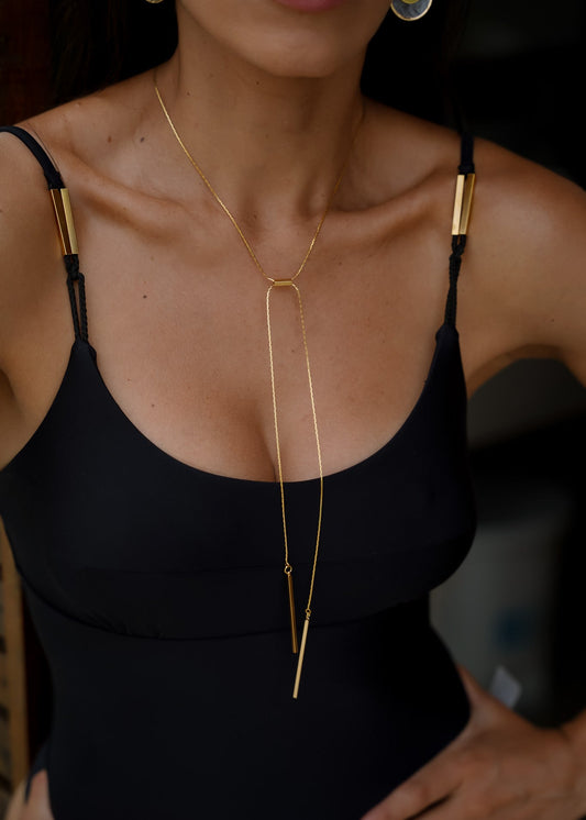 Colar Dourado Longo com Barras Pendentes