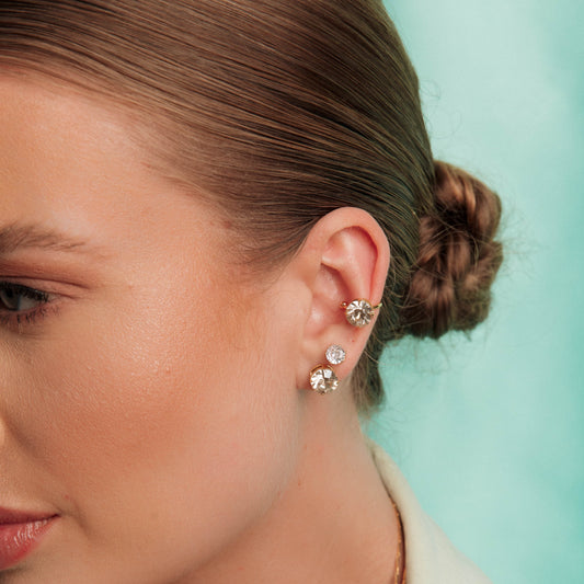 Brinco Dupla Ponto de Luz com Piercing Dourado