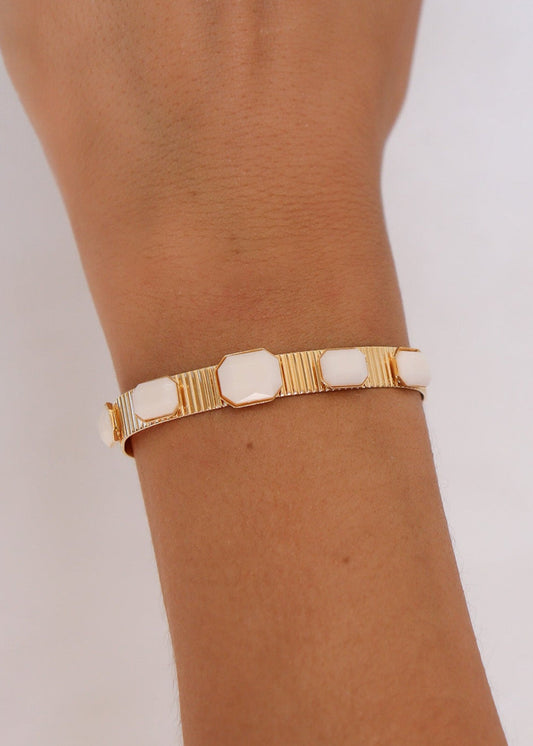 Bracelete Dourado Rígido com Pedras Brancas