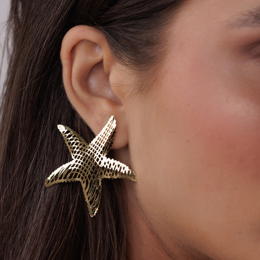 Brinco Estrela do Mar Vazada Dourado