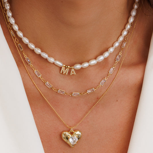 Colar Dupla Corrente Bolinhas com Pingente de Coração Cravejado e Choker Retângulos Cristais Dourado