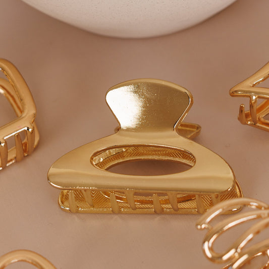 Piranha de Cabelo Média com Design Vazado Metalizado Dourado
