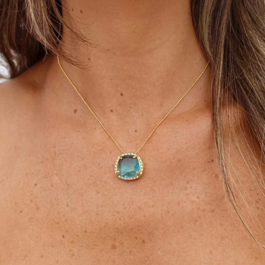 Colar Oval Azul Entorno Cravejado Dourado