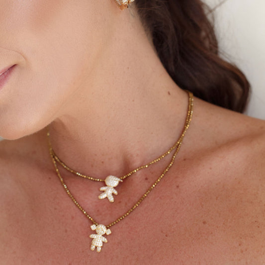 Colar Cristais com Pingente Menino/Menina Dourado