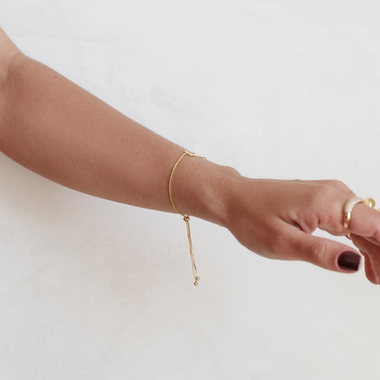 Pulseira Regulável com Escrita Dinda Dourado