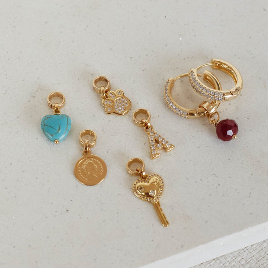 Brinco Argola Troca Charms Dourado