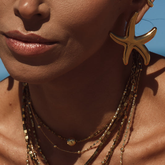 Colar Hematita com Esfera Lisa Dourado