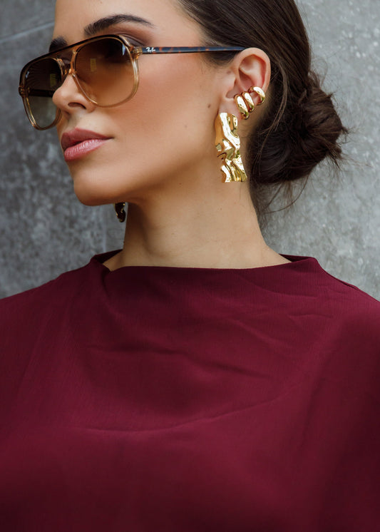 Brinco Orgânico Longo Metal Dourado