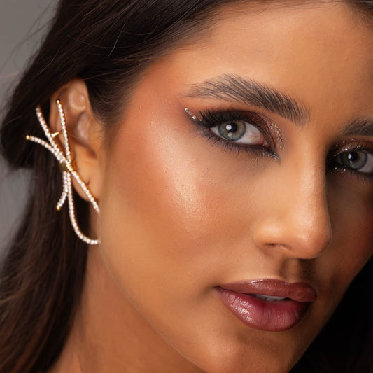 Brinco Maxi Ear Cuff Laço Cravejado Dourado